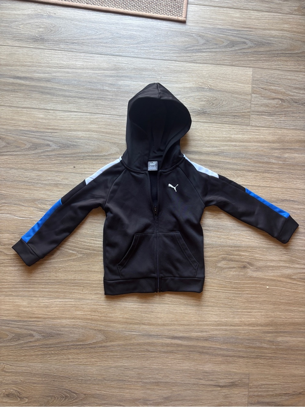 Puma Black Kids Hoodie with Blue & White Sleeve Stripes